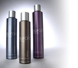 Three bottles of hair products are shown on a white background.