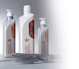 A group of hair products sitting on top of a table.